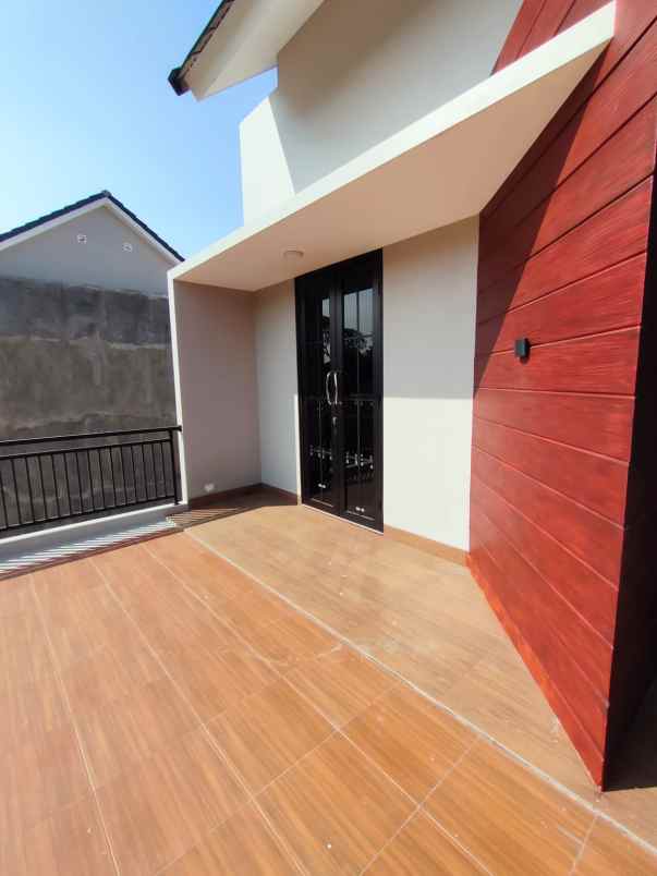 rumah 2 lantai modern tropis di tugu cimanggis depok