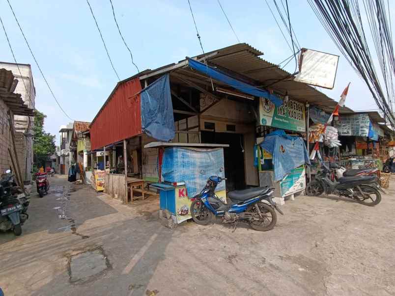 rumah berikut 3 kios pinggir jalan pramuka raya depok