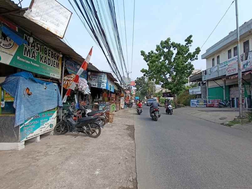 rumah dan 3 kios nego jl pramuka grogol depok