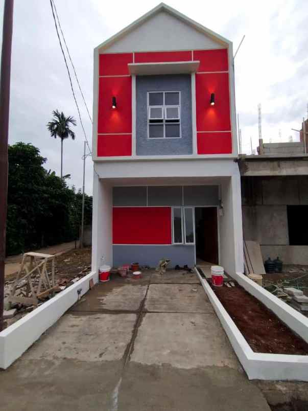 rumah minimalis pinggir jalan dekat toll