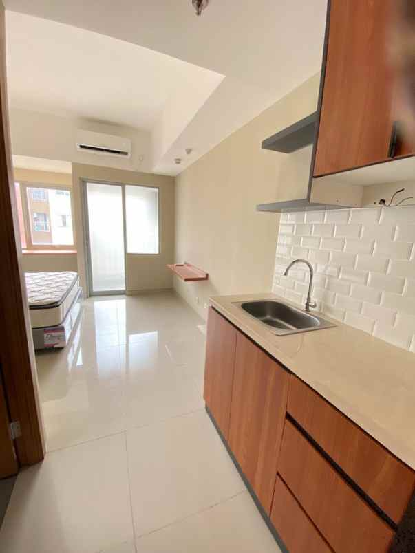 dijual apartemen siap investasi full tenant