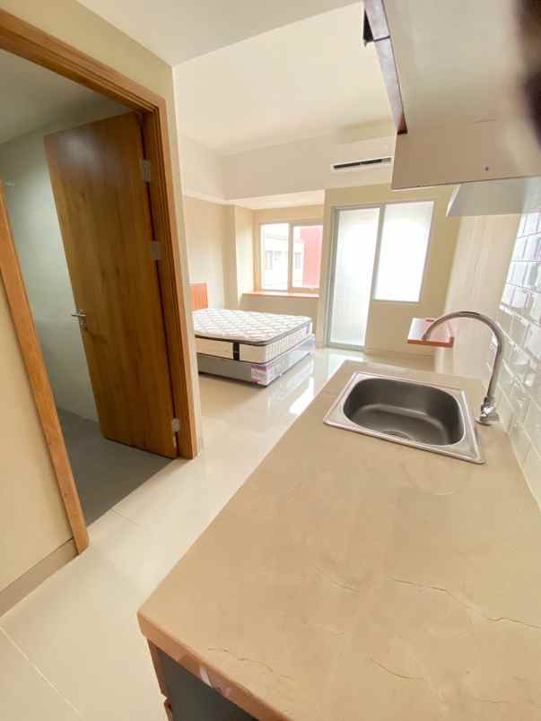 dijual apartemen siap investasi full tenant