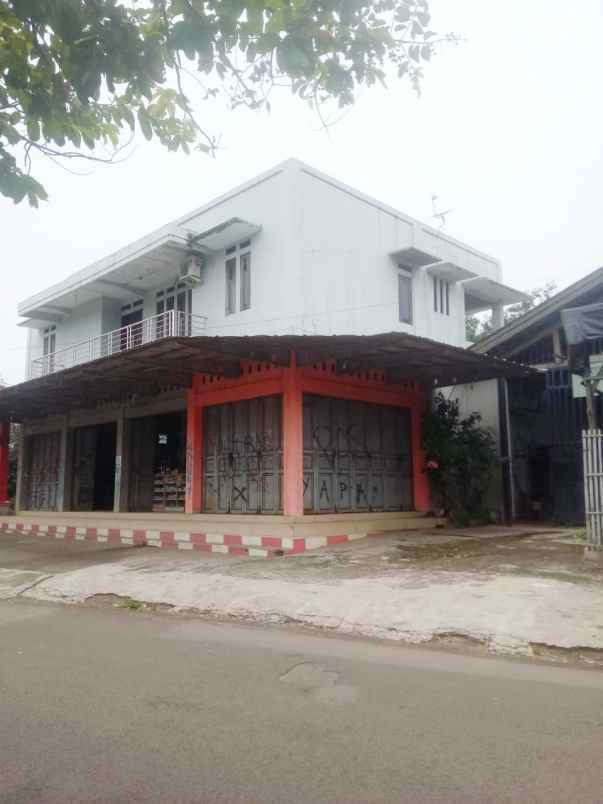 dijual bangunan toko matrial dan rumah