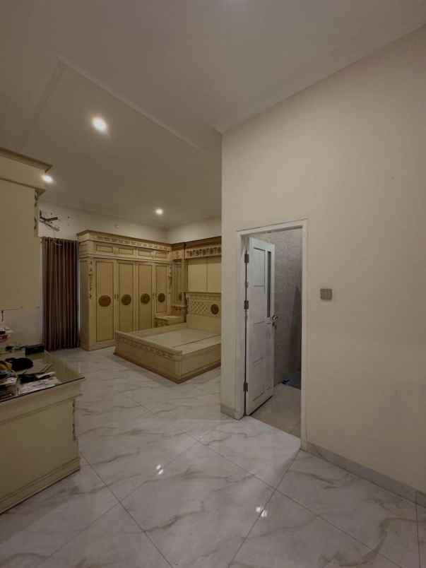 dijual rumah eastwood citraland surabaya