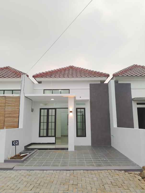 dijual rumah jl raya sawangan