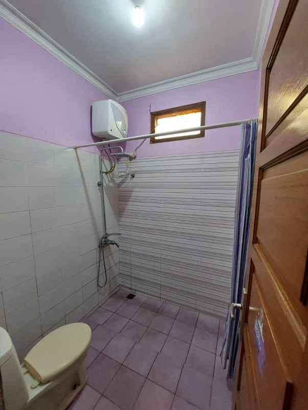 dijual rumah jln raya kalimulya