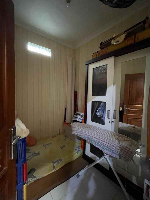 dijual rumah jln raya tole iskandar depok