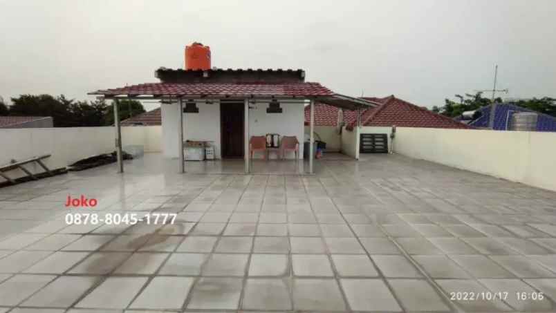 dijual rumah kayu putih