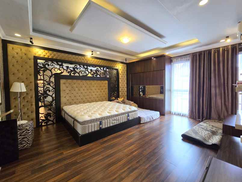 disewakan rumah cluster palm spring jgc