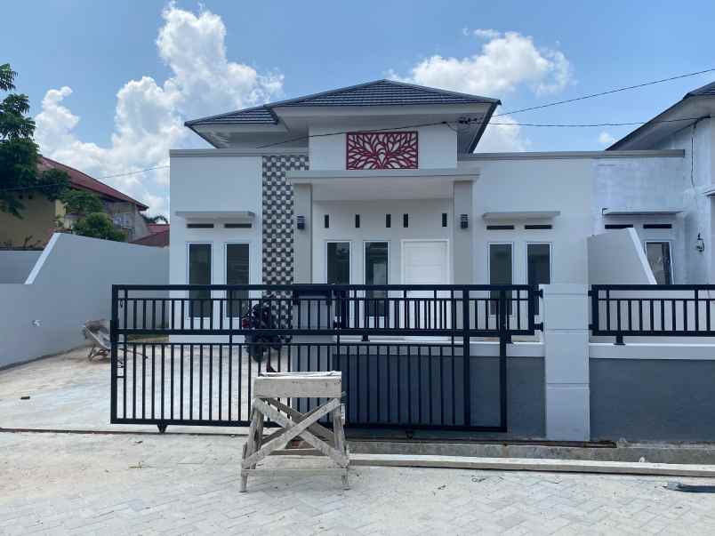 rumah cantik asri di jalan harapan raya pekanbaru