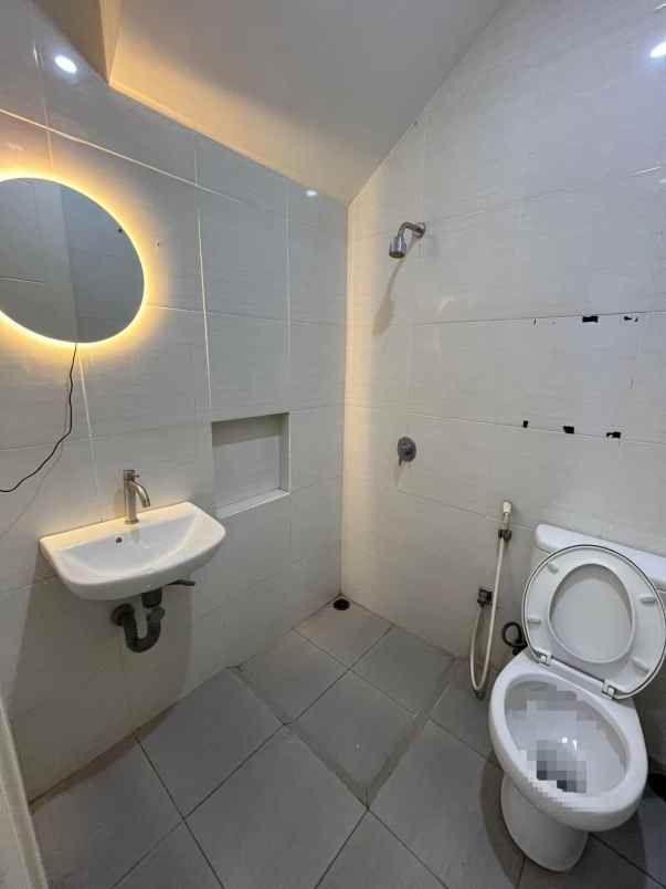 rumah grand harvest baru renov surabaya barat