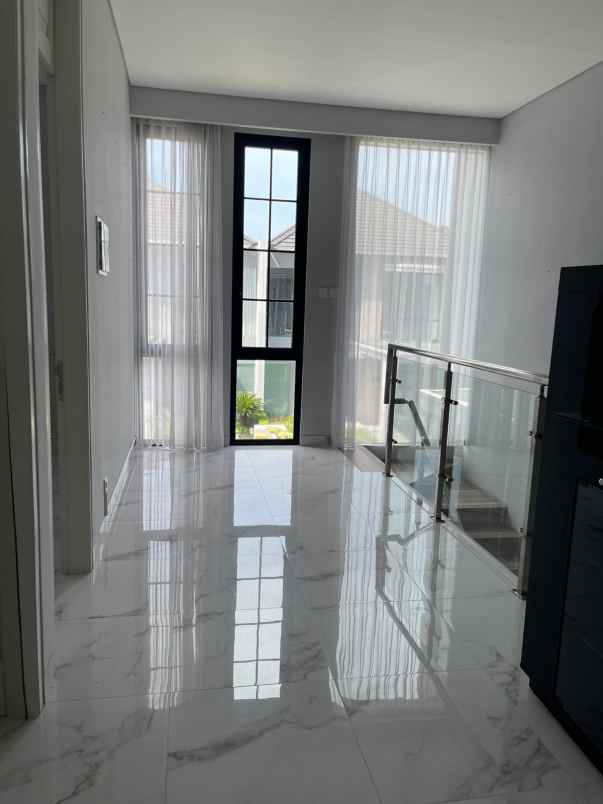 rumah grand island aruba villa pakuwon city surabaya