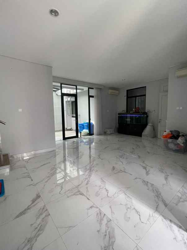 rumah grand island aruba villa pakuwon city surabaya