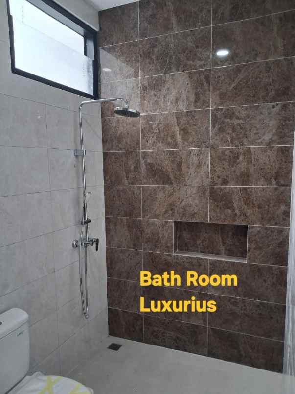 rumah manyar gress 2 lantai tengah kota surabaya timur