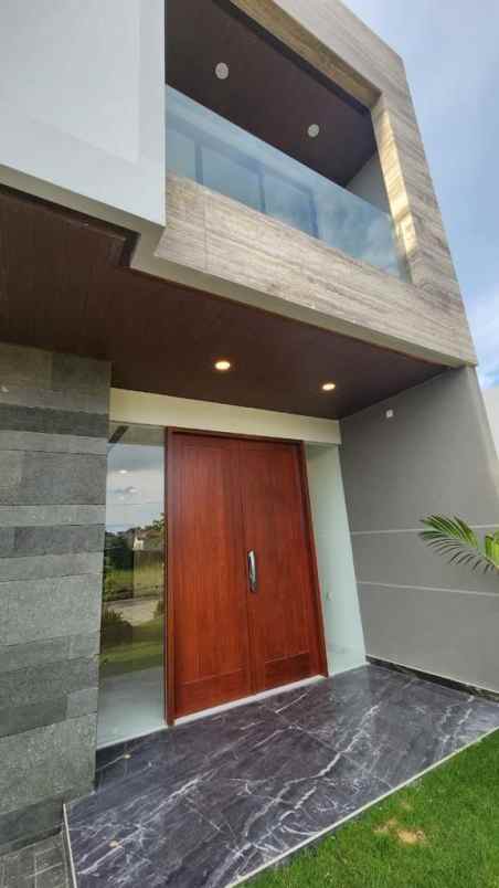 rumah murah modern di citraland graha famili surabaya