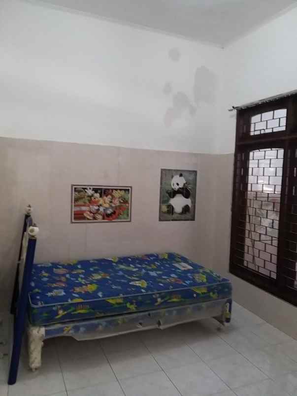 rumah sutorejo tengah hadap selatan