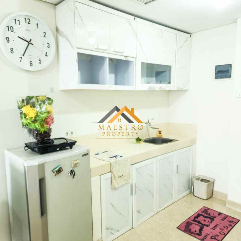 dijual apartemen podomoro city deli tower