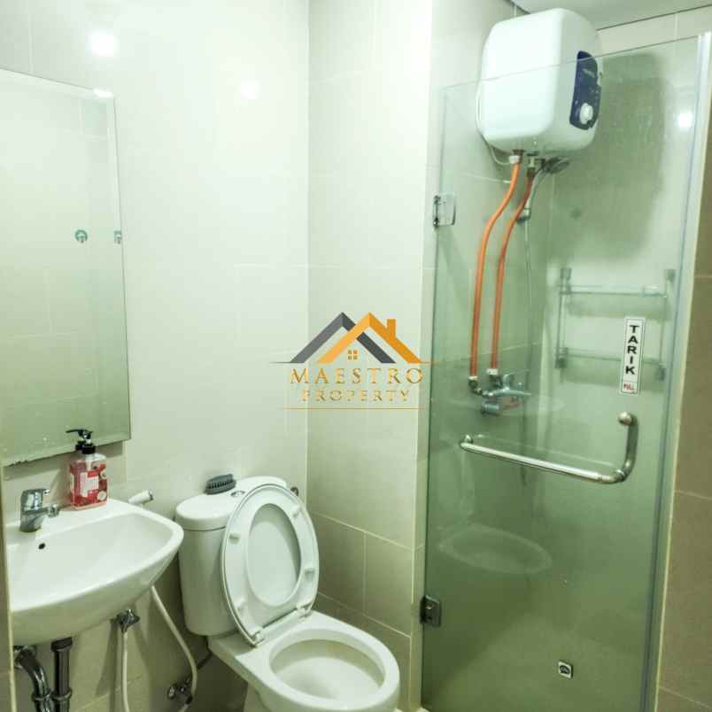 dijual apartemen podomoro city deli tower