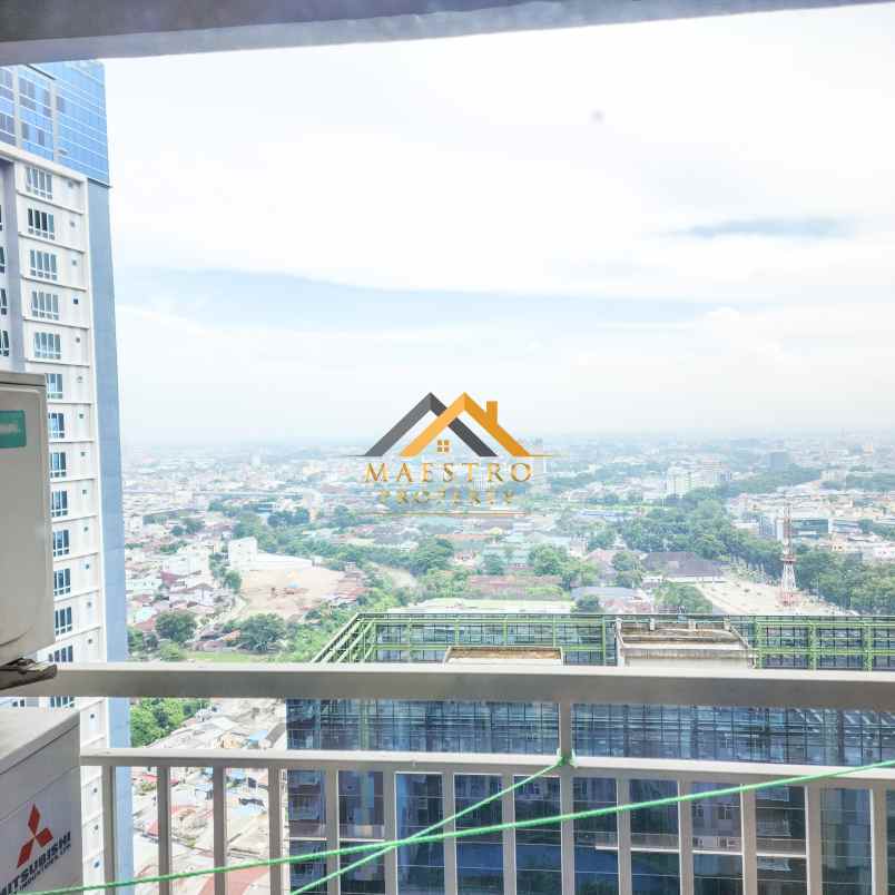 dijual apartemen podomoro city deli tower