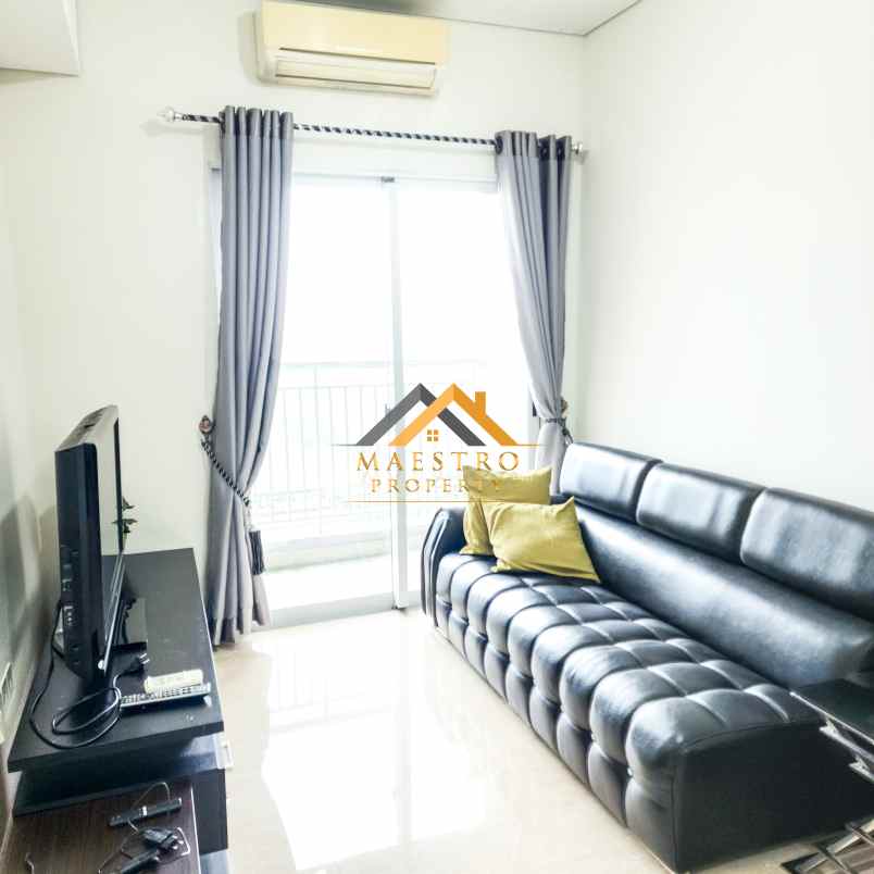 dijual apartemen podomoro city deli tower