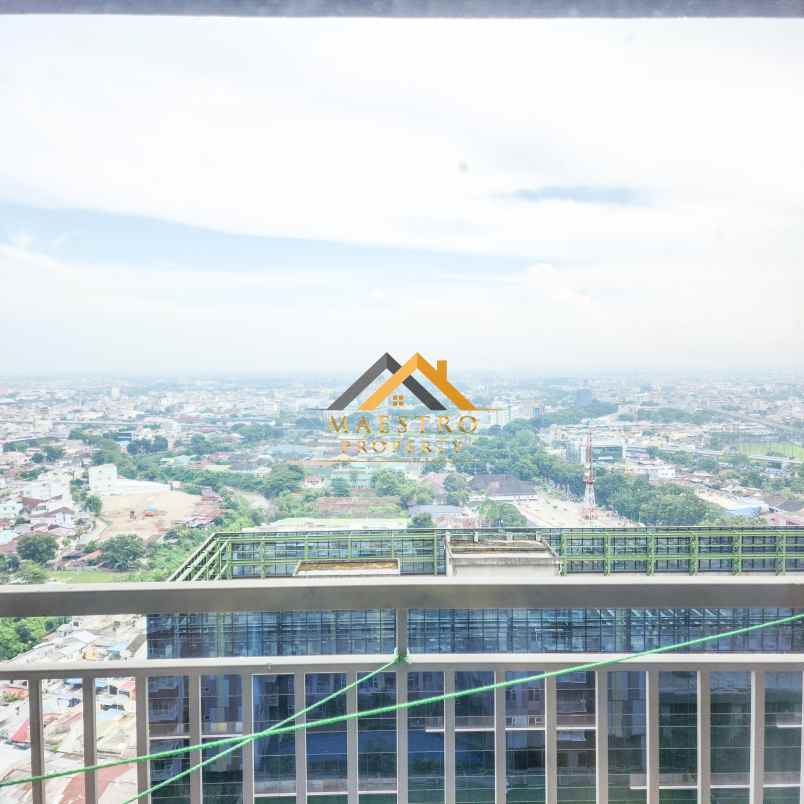 dijual apartemen podomoro city deli tower