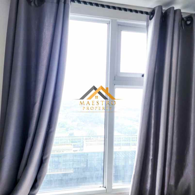 dijual apartemen podomoro city deli tower