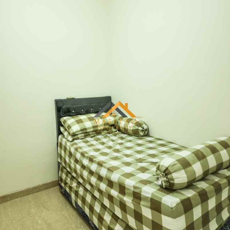 dijual apartemen podomoro city deli tower