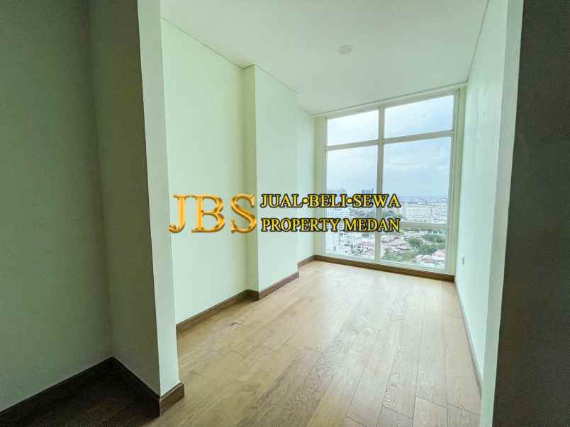 dijual apartemen the reiz condo