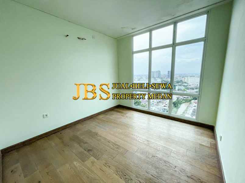 dijual apartemen the reiz condo