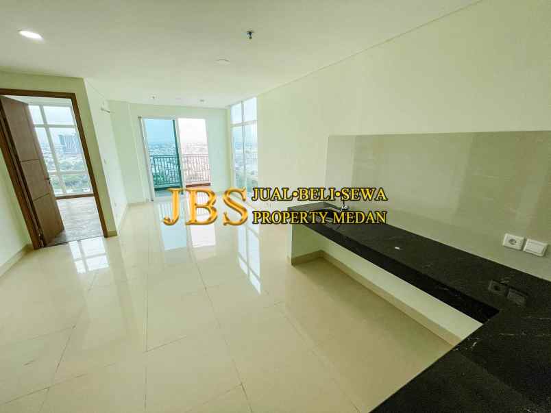 dijual apartemen the reiz condo