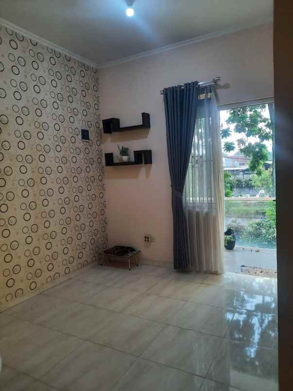 dijual rumah cluster kamayangan