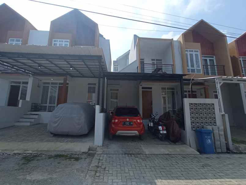 dijual rumah cluster villa tropis