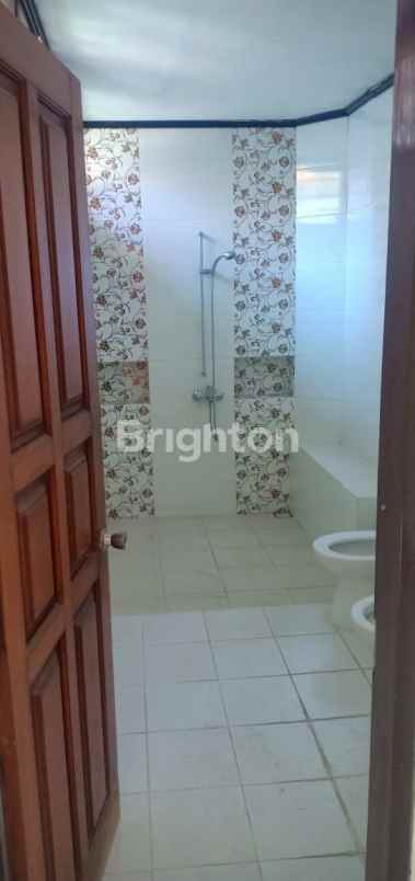 dijual rumah dharmahusada indah