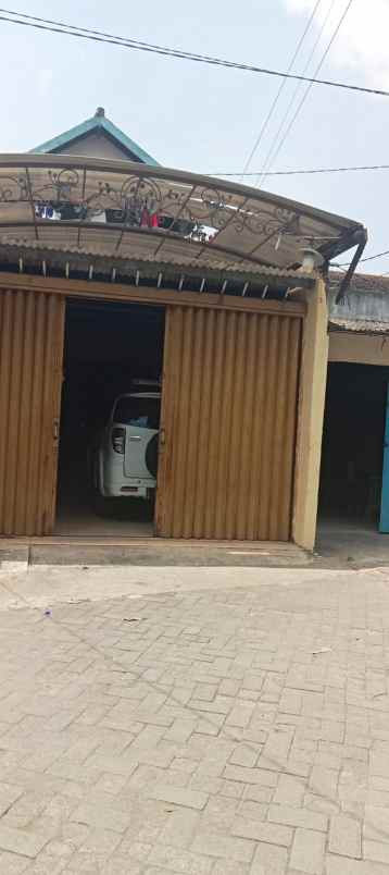 dijual rumah di woltermongensidi semarang