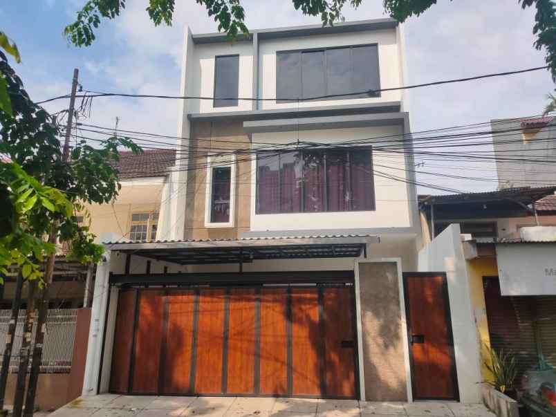 dijual rumah jl delima raya tanjung