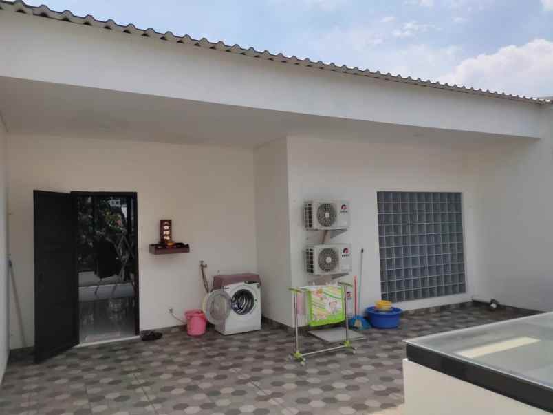 dijual rumah jl delima raya tanjung