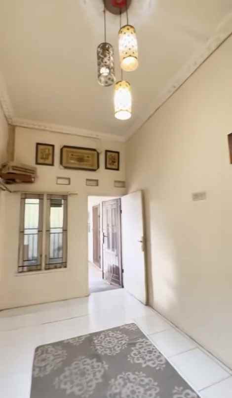 dijual rumah jl kalibaru cilodong