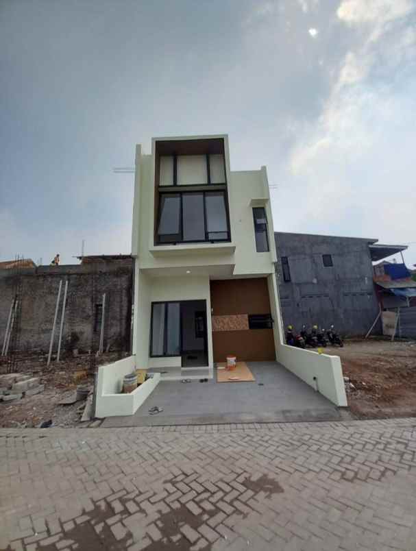 dijual rumah karang tengah