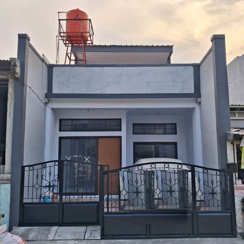 dijual rumah puri harapan