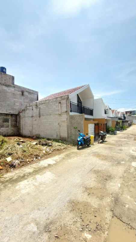 rumah mezzanine semi 2 lantai cipayung depok