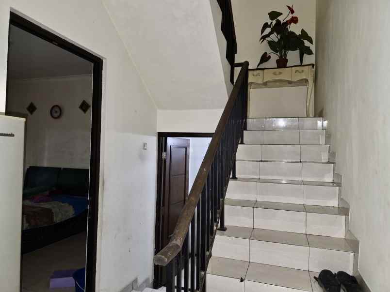 rumah murah dua lantai di aralia harapan indah bekasi