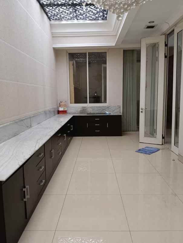 rumah pakuwon indah cluster la riz wood