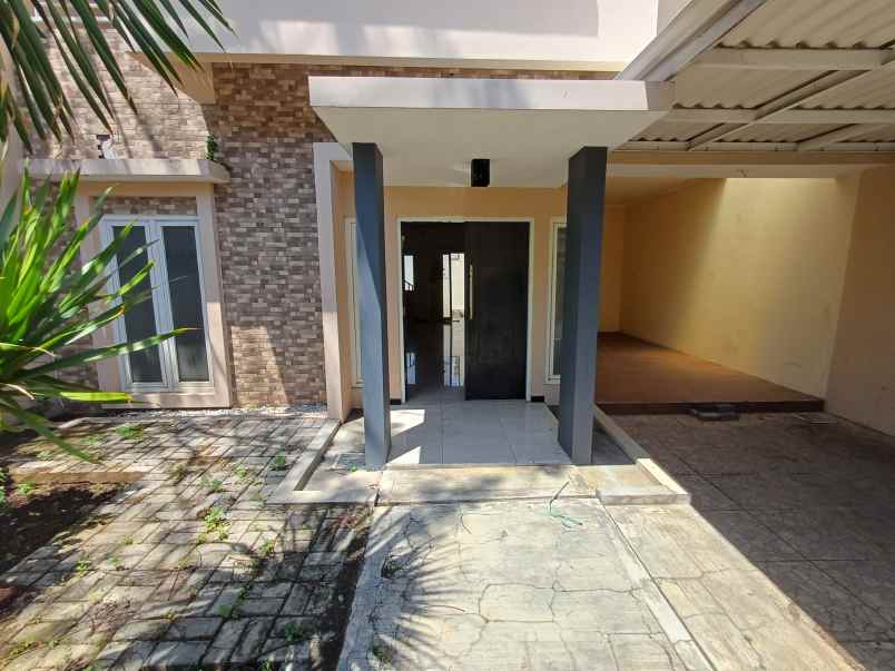 rumah taman rivera regency