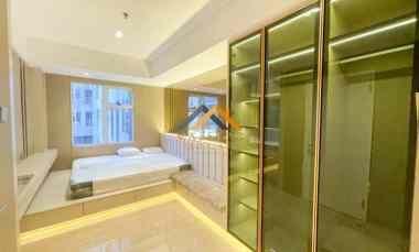 dijual apartemen podomoro city deli tower