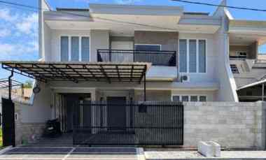 Rumah Dharmahusada Indah Minimalis Siap Huni Carport 2 Garasi 1 5M