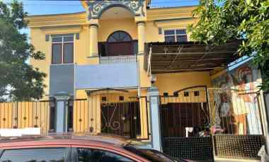 dijual rumah jalan wiguna timur