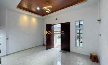 dijual rumah komplek mados royal suite