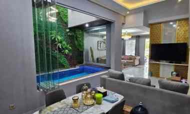 dijual rumah kota harapan indah