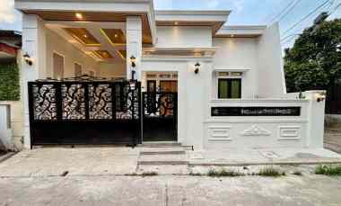 dijual rumah perumahan taman raya
