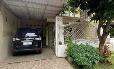 dijual rumah puri surya jaya taman boston